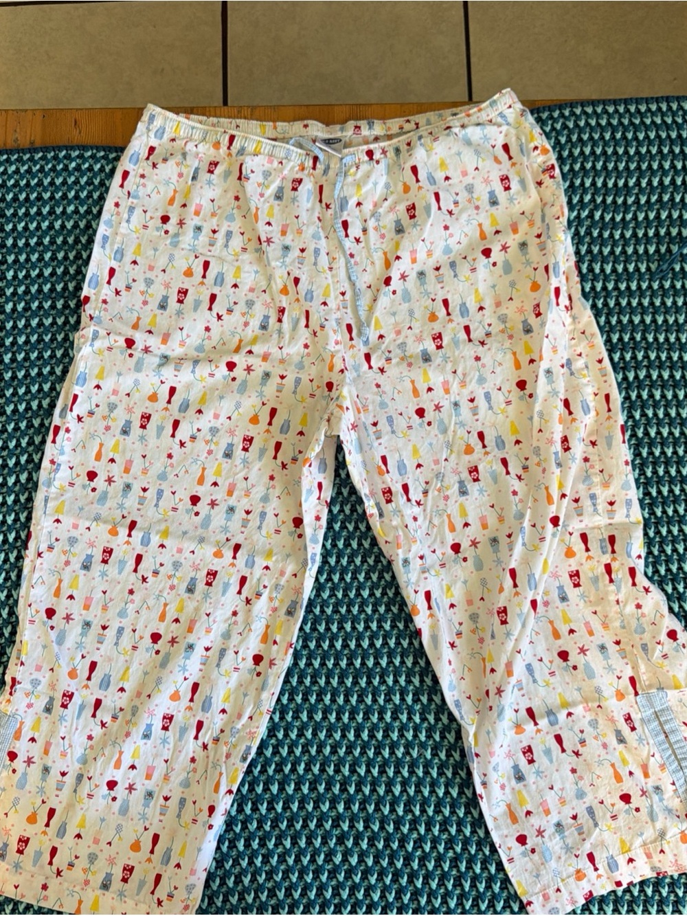 Old Navy White Pajama Pants with Red, Yellow and Blue Toy Print